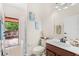 Bathroom featuring walk out access to outdoor deck and garden tub at 555 Carey Way, Orlando, FL 32825