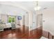 Spacious bedroom featuring hardwood floors and ensuite bath at 555 Carey Way, Orlando, FL 32825