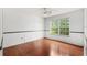 Bright bedroom with natural lighting and wainscoting at 555 Carey Way, Orlando, FL 32825