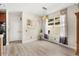 Open concept dining area featuring hardwood floors, modern lighting, and lots of natural light at 555 Carey Way, Orlando, FL 32825