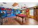 Fun-filled game room featuring unique decor and a pool table at 555 Carey Way, Orlando, FL 32825