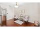 Hallway featuring hardwood floors, open space, and natural light at 555 Carey Way, Orlando, FL 32825