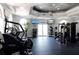 Well-equipped fitness center with treadmills, weight machines, ceiling fans and motivational sayings at 6117 Metrowest Blvd # 106, Orlando, FL 32835
