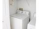 Bright laundry room is equipped with a washer and dryer ready for use at 6117 Metrowest Blvd # 106, Orlando, FL 32835