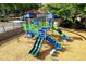 Community playground featuring colorful climbing structures, slides, and soft landing at 6117 Metrowest Blvd # 106, Orlando, FL 32835