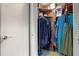 Walk-in closet with wood paneling and shelves for optimal storage and organization at 808 Denton Rd, Winter Park, FL 32792