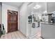 Inviting entryway with natural wood door leading to the spacious kitchen area at 808 Denton Rd, Winter Park, FL 32792