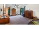 Spacious main bedroom with natural light, ceiling fan, and views of the room at 808 Denton Rd, Winter Park, FL 32792