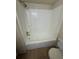 Standard bathtub with shower head, tiled floor, and toilet at 128 Water Front Way # 300, Altamonte Springs, FL 32701