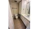 Cozy bathroom featuring a white vanity, sink, and tile floors at 128 Water Front Way # 300, Altamonte Springs, FL 32701