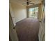 A bedroom with a ceiling fan and carpet, and a sliding door leading to a balcony at 128 Water Front Way # 300, Altamonte Springs, FL 32701