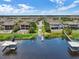 Aerial view of waterfront homes with boat docks on lake; perfect for boating and lakeside living at 15160 Avenue Of The Arbors, Winter Garden, FL 34787