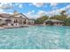 Enjoy this sparkling pool with comfortable lounge chairs, perfect for relaxation and social gatherings at 15160 Avenue Of The Arbors, Winter Garden, FL 34787