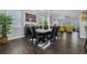 Elegant dining room featuring a stylish table, modern decor, and ample space for Gathering gatherings and entertaining at 15160 Avenue Of The Arbors, Winter Garden, FL 34787