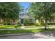 Charming two-story home with well-manicured lawn and mature trees in a desirable neighborhood at 15160 Avenue Of The Arbors, Winter Garden, FL 34787
