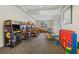 Well-equipped game room with arcade games, play tables, and fun activities for everyone to enjoy at 15160 Avenue Of The Arbors, Winter Garden, FL 34787