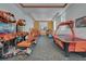 Fun-filled game room with various arcade games and activities, perfect for entertaining and creating lasting memories at 15160 Avenue Of The Arbors, Winter Garden, FL 34787