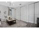 Cozy living room with neutral color scheme, modern lighting, and comfortable seating, perfect for relaxation at 15160 Avenue Of The Arbors, Winter Garden, FL 34787