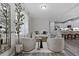 Bright living room featuring modern decor, hardwood floors, and stylish furnishings at 15160 Avenue Of The Arbors, Winter Garden, FL 34787