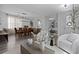 Open-concept living space featuring hardwood floors and modern decor throughout at 15160 Avenue Of The Arbors, Winter Garden, FL 34787