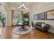 Luxurious lobby with hardwood floors, comfortable seating, and elegant decor creating an inviting atmosphere at 15160 Avenue Of The Arbors, Winter Garden, FL 34787