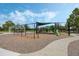Well-maintained playground with swings, slides, and covered picnic area for Gathering fun and outdoor activities at 15160 Avenue Of The Arbors, Winter Garden, FL 34787