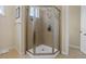 Updated shower with glass surround, tile walls, updated fixtures, and natural light at 15160 Avenue Of The Arbors, Winter Garden, FL 34787
