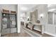 Bright entryway featuring hardwood floors, modern console table, and decorative accents at 161 Purcell Dr, Alafaya, FL 32825