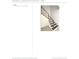 Staircase featuring stainless steel vertical rods and modern lighting at 161 Purcell Dr, Alafaya, FL 32825