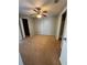 Bedroom featuring plush carpeting, a ceiling fan, and ample space for relaxation and personalization at 2585 Grassy Point Dr # 313, Lake Mary, FL 32746