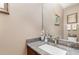 Powder room with granite countertop and modern faucet at 3321 San Jacinto Cir # 116, Sanford, FL 32771