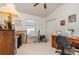 Bedroom with natural light, ceiling fan, closet, and light carpet at 3321 San Jacinto Cir # 116, Sanford, FL 32771