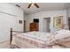 Bright bedroom featuring a vaulted ceiling and walk-in closet at 3321 San Jacinto Cir # 116, Sanford, FL 32771