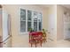 Bright dining area with shuttered windows and tile flooring at 3321 San Jacinto Cir # 116, Sanford, FL 32771