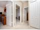 Hallway with multiple doors that lead to other rooms at 3321 San Jacinto Cir # 116, Sanford, FL 32771