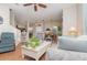 Bright living space with an open layout, comfortable seating, and view to the dining room at 3321 San Jacinto Cir # 116, Sanford, FL 32771