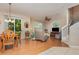 Combined living and dining space featuring an open floor plan, stairs, and sliding door at 3321 San Jacinto Cir # 116, Sanford, FL 32771