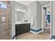 Bright bathroom with a walk-in shower, a double sink vanity, and tile flooring at 3716 Paradiso Cir, Kissimmee, FL 34746