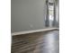 Bedroom with gray walls, white trim, and a window at 3716 Paradiso Cir, Kissimmee, FL 34746