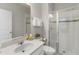 Bathroom with a glass shower door, modern fixtures, and white vanity at 4201 Oakview Dr, Davenport, FL 33837