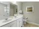 Bathroom featuring double sinks, a large mirror, and a separate shower at 4201 Oakview Dr, Davenport, FL 33837