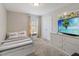 Bright bedroom with a comfortable bed and a dresser with a TV display at 4201 Oakview Dr, Davenport, FL 33837