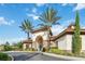 Beautiful clubhouse with tile roof and landscaping, offering amenities for residents at 4201 Oakview Dr, Davenport, FL 33837
