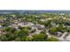 Aerial view of the neighborhood with lush greenery, showcasing a peaceful residential community at 59 W 10Th St, Apopka, FL 32703
