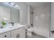 Contemporary bathroom with a tub, shower, and modern vanity at 59 W 10Th St, Apopka, FL 32703