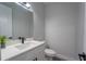 Bathroom with an undermount sink and a large mirror at 59 W 10Th St, Apopka, FL 32703