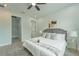 Calming bedroom with carpet and neutral paint and minimalist furniture at 59 W 10Th St, Apopka, FL 32703
