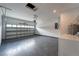 Spacious garage with an electric door, washer, and dryer hookups, offering convenience at 59 W 10Th St, Apopka, FL 32703