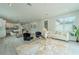 Spacious living room with hardwood floors, neutral paint, and modern decor throughout at 59 W 10Th St, Apopka, FL 32703