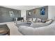 Spacious game room featuring a foosball table, couches, and Star Wars themed decor at 8951 Amelia Downs Trl, Kissimmee, FL 34747